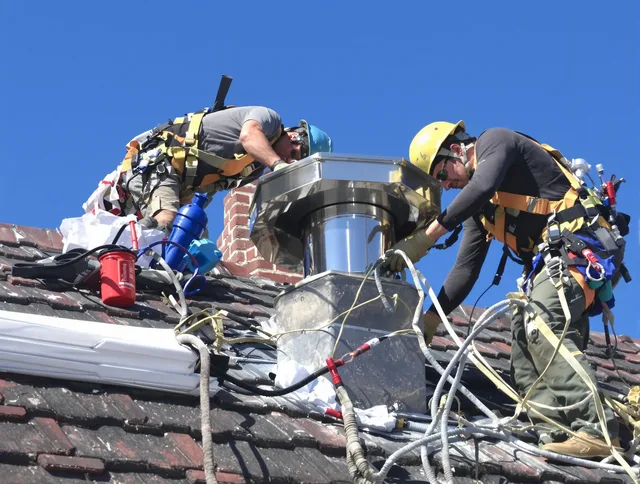 Protective chimney cap installed by La Puente Chimney Sweep in La Puente, CA
