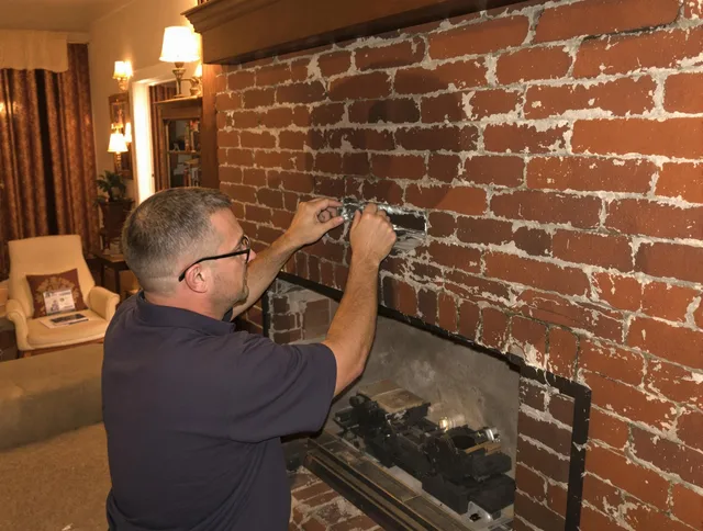La Puente Chimney Sweep expert fixing a fireplace in La Puente, CA